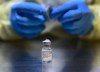 A health-care worker prepares a dose of the Pfizer-BioNTech COVID-19 vaccine at a UHN COVID-19 vaccine clinic in Toronto on Thursday, January 7, 2021. THE CANADIAN PRESS/Nathan Denette