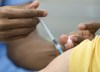 A senior receives their COVID-19 vaccination, Monday, March 1, 2021 in Montreal.  Health officials in Prince Edward Island say they expect to be able to give a first dose of the COVID-19 vaccine to all adults in the province by July 1. THE CANADIAN PRESS/Ryan Remiorz