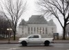 A motor vehicle passes in front of the Supreme Court of Canada in Ottawa, Thursday March 25, 2021. THE CANADIAN PRESS/Adrian Wyld