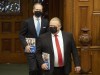 Ontario Premier Doug Ford and Finance Minister Peter Bethlenfalvy arrive in the Legislature in Toronto, Wednesday March 24, 2021. THE CANADIAN PRESS/Frank Gunn