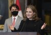 Prime Minister Justin Trudeau looks on as Deputy Prime Minister and Finance Minister Chrystia Freeland responds to a question during a news conference on Parliament Hill in Ottawa, Tuesday, Aug. 18, 2020. THE CANADIAN PRESS/Adrian Wyld