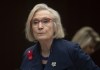 Crown-Indigenous Relations Minister Carolyn Bennett takes her seat as she wait to appear before the Indigenous and Northern Affairs committee in Ottawa, March 10, 2020. Federal officials are facing calls for greater clarity on how a proposed new law to harmonize Canada’s laws with the United Nations Declaration on the Rights of Indigenous People could affect future development projects and government decisions. THE CANADIAN PRESS/Adrian Wyld