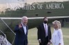 President Joe Biden, with first lady Jill Biden, waves as they walk from Marine One upon arrival on the Ellipse at the White House, Sunday, May 23, 2021, in Washington. Biden is returning from Camp David. (AP Photo/Alex Brandon)