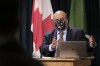 Saskatchewan chief medical health officer, Dr. Saqib Shahab, speaks at a COVID-19 media update at the Legislative Building in Regina on Wednesday Dec. 9, 2020. THE CANADIAN PRESS/Michael Bell