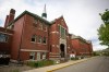 The former Kamloops Indian Residential School is seen on Tk’emlups te Secwépemc First Nation in Kamloops, B.C. on Thursday, May 27, 2021. Federal New Democrats are calling for an emergency debate in the House of Commons on the recent discovery of the remains of 215 children on the grounds of the former Kamloops Indian Residential School. THE CANADIAN PRESS/Andrew Snucins