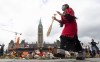 Nisga'a dancer Rosita Martinez takes part in a ceremony on Parliament Hill Thursday June 3, 2021 in Ottawa. A bill creating a statutory holiday to commemorate the tragic legacy of residential schools in Canada has been passed unanimously by the Senate. THE CANADIAN PRESS/Adrian Wyld