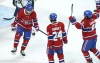 Montreal Canadiens' Artturi Lehkonen, left, celebrates his goal with teammates Phillip Danault and Ben Chiarot during second period NHL Stanley Cup playoff hockey action against the Winnipeg Jets, in Montreal, Sunday, June 6, 2021. THE CANADIAN PRESS/Paul Chiasson