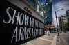 A message is painted on the boarded up windows of a closed Aritzia clothing store on Robson Street, in Vancouver, on Wednesday, May 6, 2020.  THE CANADIAN PRESS/Darryl Dyck