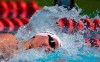 Canada's Penny Oleksiak competes in women's 100m freestyle during the 2018 Commonwealth Games on the Gold Coast, Australia, Sunday, April 8, 2018. The Olympic swim trials start Saturday in Toronto's Pan Am Sports Centre after cancellation in 2020 and a pair of postponements in 2021 because of the COVID-19 pandemic. THE CANADIAN PRESS/AP-Rick Rycroft