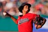 Cleveland Indians starting pitcher Triston McKenzie delivers in the first inning of a baseball game against the Kansas City Royals, Friday, July 9, 2021, in Cleveland. (AP Photo/Tony Dejak)