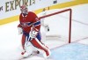 Montreal Canadiens goaltender Carey Price looks up at the replay following a goal by the Vegas Golden Knights during second period of Game 3 of the NHL Stanley Cup semifinal on June 18, 2021 in Montreal. THE CANADIAN PRESS/Paul Chiasson