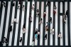 People wearing protective masks to help curb the spread of the coronavirus walk along a pedestrian crossing Thursday, July 22, 2021, in Tokyo. The Japanese capital confirmed more than 1900 new coronavirus cases on Thursday. (AP Photo/Eugene Hoshiko)