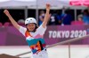 Momiji Nishiya of Japan reacts after winning the women's street skateboarding finals at the 2020 Summer Olympics, Monday, July 26, 2021, in Tokyo, Japan. (AP Photo/Ben Curtis)