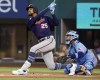 FILE - In this June 20, 2021, file photo, Minnesota Twins Byron Buxton (25) hits a home run in the first inning against the Texas Rangers during a baseball game in Arlington, Texas. Buxton does not have a new contract yet. He does not have a target return date from his current injury, either. The Twins center fielder says he still has a strong desire to remain with the organization, however. (AP Photo/Richard W. Rodriguez, File)