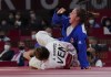 Catherine Beauchemin-Pinard, right, of Canada reacts after defeating Anriquelis Barrios of Venezuela to win the bronze medal in the Women Judo 63kg during the Tokyo Olympics in Tokyo, Japan on Tuesday, July 27, 2021. THE CANADIAN PRESS/Nathan Denette