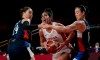 Canada's Kia Nurse (5), centre, drives between South Korea's Ji Su Park (19), left, and Hyeyoon Bae (11) during women's basketball preliminary round action at the Tokyo Summer Olympic Games, in Saitama, Japan, Thursday, July 29, 2021. THE CANADIAN PRESS/AP-Eric Gay