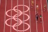 Habitam Alemu, of Ethiopia, and Athing Mu, of United States, head to the finish competes during the first round of the women's 800-metre at the 2020 Summer Olympics, Friday, July 30, 2021, in Tokyo. Canada's Melissa Bishop-Nriagu runs in fourth. (AP Photo/Morry Gash)