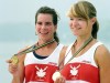 Marnie McBean, left, and Kathleen Heddle show their gold medals in the coxless pairs rowing competition at the Olympic Games in Banyoles, Spain on Aug. 1, 1992. For Mike Bryden, watching the Tokyo Olympics from his home in Vancouver has brought light and joy to his family in what has been an otherwise emotional year. Bryden is the husband of three-time Olympic rowing champion Kathleen Heddle, who died of cancer at age 55 in January. THE CANADIAN PRESS/Ron Poling