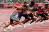Canada's Andre De Grasse competes in the men's 100m heats event during the Tokyo Summer Olympic Games, in Tokyo, Saturday, July 31, 2021. De Grasse cruised into the semifinals of the men's 100 metres, winning his heat in a season-best time of 9.91 seconds. THE CANADIAN PRESS/Frank Gunn