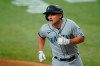 Seattle Mariners' Kyle Seager crosses the plate after hitting a two-run home run during the first inning of the team's baseball game against the Texas Rangers in Arlington, Texas, Saturday, July 31, 2021. (AP Photo/Tony Gutierrez)