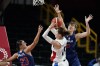 South Korea's Ji Su Park (19) puts up a shot against Serbia's Ana Dabovic (23) and Tina Krajisnik (33) during a women's preliminary round basketball game at the 2020 Summer Olympics, Sunday, Aug. 1, 2021, in Saitama, Japan. (AP Photo/Charlie Neibergall)