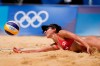 Melissa Humana-Paredes, of Canada digs out the ball during a women's beach volleyball match against Spain at the 2020 Summer Olympics, Monday, Aug. 2, 2021, in Tokyo, Japan. (AP Photo/Petros Giannakouris)
