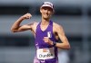 Evan Dunfee, of Richmond, B.C., celebrates after finishing the 10,000 metre race walk event in a time of 38:39.72, setting a new Canadian record, during the Harry Jerome International Track Classic, in Burnaby, B.C., on Saturday, June 12, 2021. THE CANADIAN PRESS/Darryl Dyck