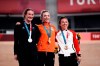 Gold medallist Shanne Braspennincx of Team Netherlands, center, celebrates on the podium with silver medallist Ellesse Andrews of Team New Zealand, left, and bronze medallist Lauriane Genest of Team Canada, during a medal ceremony for the track cycling women's keirin at the 2020 Summer Olympics, Thursday, Aug. 5, 2021, in Izu, Japan. THE CANADIAN PRESS/AP/Thibault Camus