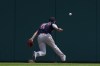 Boston Red Sox's Enrique Hernandez can't reach a Detroit Tigers' Jeimer Candelario fly ball that bounced for a ground-rule double in the fifth inning of a baseball game in Detroit, Thursday, Aug. 5, 2021. (AP Photo/Paul Sancya)
