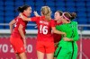 Christine Sinclair, left, celebrates with teammates as Canada celebrates after defeating Sweden in the penalty shoot-out in the women's soccer final during the summer Tokyo Olympics in Yokohama, Japan on Friday, August 6, 2021. THE CANADIAN PRESS/Frank Gunn