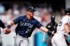 Seattle Mariners shortstop Dylan Moore (25) tags out New York Yankees' DJ LeMahieu during the sixth inning of a baseball game on Saturday, Aug. 7, 2021, in New York. (AP Photo/Adam Hunger)
