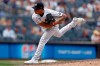 New York Yankees pitcher Jonathan Loaisiga delivers a pitch during the ninth inning of a baseball game against the Seattle Mariners on Saturday, Aug. 7, 2021, in New York. The Yankees won 5-4. (AP Photo/Adam Hunger)