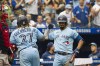 Toronto Blue Toronto Blue Jays' Vladimir Guerrero Jr. (27) and Marcus Semien (10) celebrate after Guerrero Jr. hits a home run in the fifth inning of American League baseball against the Boston Red Sox in Toronto, on Sunday, August 8, 2021. THE CANADIAN PRESS/Christopher Katsarov