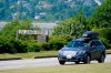 FILE - In this June 8, 2021, file photo, a car heads into the U.S. from Canada at the Peace Arch border crossing in Blaine, Wash. Canada is lifting its prohibition Monday, Aug. 9, on Americans crossing the border to shop, vacation or visit, but the United States is keeping similar restrictions in place for Canadians. The reopening Monday is part of a bumpy return to normalcy from COVID-19 travel bans. (AP Photo/Elaine Thompson, File)