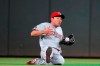 Cincinnati Reds center fielder Shogo Akiyama makes a sliding catch on a fly ball hit by Atlanta Braves' Ozzie Albies during the fifth inning of a baseball game Tuesday, Aug. 10, 2021, in Atlanta. (AP Photo/John Bazemore)