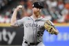 Colorado Rockies starting pitcher Jon Gray delivers during the first inning of a baseball game against the Houston Astros, Tuesday, Aug. 10, 2021, in Houston. (AP Photo/Eric Christian Smith)