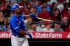 Toronto Blue Jays' Teoscar Hernandez watches his three-run home run during the fifth inning of the team's baseball game against the Los Angeles Angels on Wednesday, Aug. 11, 2021, in Anaheim, Calif. (AP Photo/Marcio Jose Sanchez)