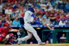 Los Angeles Dodgers' Cody Bellinger hits a two-run home run off Philadelphia Phillies pitcher Kyle Gibson during the fourth inning of a baseball game, Wednesday, Aug. 11, 2021, in Philadelphia. (AP Photo/Matt Slocum)