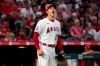 Los Angeles Angels starting pitcher Shohei Ohtani reacts after Toronto Blue Jays' George Springer grounded into a double play during the third inning of a baseball game Thursday, Aug. 12, 2021, in Anaheim, Calif. (AP Photo/Marcio Jose Sanchez)