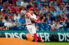 Philadelphia Phillies third baseman Ronald Torreyes throws to first on a ground out by Cincinnati Reds' Tyler Mahle during the fifth inning of a baseball game, Friday, Aug. 13, 2021, in Philadelphia. (AP Photo/Matt Slocum)