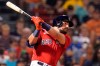 Boston Red Sox's Kyle Schwarber watches his lineout in the fifth inning of the team's baseball game against the Baltimore Orioles at Fenway Park, Friday, Aug. 13, 2021, in Boston. (AP Photo/Elise Amendola)