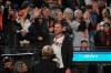 Former NFL quarterback Alex Smith waves to fans while introduced during a baseball game between the San Francisco Giants and the Colorado Rockies in San Francisco, Friday, Aug. 13, 2021. (AP Photo/Jeff Chiu)