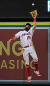 Los Angeles Angels center fielder Brandon Marsh leaps up to catch a ball hit by Houston Astros' Jake Meyers in the fourth inning of a baseball game Saturday, Aug 14, 2021, in Anaheim, Calif. (AP Photo/John McCoy)