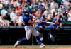 Toronto Blue Jays' Randal Grichuk hits a two-run home run off a pitch by Seattle Mariners starter Logan Gilbert during the second inning of a baseball game, Sunday, Aug. 15, 2021, in Seattle. (AP Photo/John Froschauer)