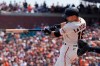 San Francisco Giants' Tommy La Stella hits a two-run double against the Colorado Rockies during the fifth inning of a baseball game in San Francisco, Sunday, Aug. 15, 2021. (AP Photo/Jeff Chiu)