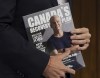 Conservative Leader Erin O'Toole holds a copy of his party's recovery plan as he campaigns Monday, August 16, 2021 in Ottawa. Canadians will vote in a federal election Sept. 20th.THE CANADIAN PRESS/Ryan Remiorz