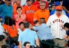 FILE - In this May 29, 2019, file photo, a young child is carried from the stands after being injured by a foul ball off the bat of Chicago Cubs' Albert Almora Jr. during the fourth inning of a baseball game against the Houston Astros in Houston. The Astros have agreed to a settlement with the family of the 2-year-old girl struck by a foul ball during the game at Minute Maid Park, the family's attorney said Monday, Aug. 16, 2021. (AP Photo/David J. Phillip, File)