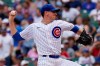 Chicago Cubs starting pitcher Kyle Hendricks throws against the Milwaukee Brewers during the first inning of a baseball game in Chicago, Thursday, Aug. 12, 2021. (AP Photo/Nam Y. Huh)