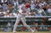 Los Angeles Angels' Shohei Ohtani hits a single against the Detroit Tigers in the first inning of a baseball game in Detroit, Tuesday, Aug. 17, 2021. (AP Photo/Paul Sancya)