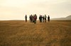 Young men who say they deserted the Afghan military and fled to Turkey through Iran walk in the countryside in Tatvan, in Bitlis Province in eastern Turkey, Tuesday, Aug. 17, 2021. Turkey is concerned about increased migration across the Turkish-Iranian border as Afghans flee the Taliban advance in their country.(AP Photo/Emrah Gurel)